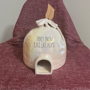 Rae Dunn “There’s Snow Place Like Home” igloo-shaped decorative birdhouse.